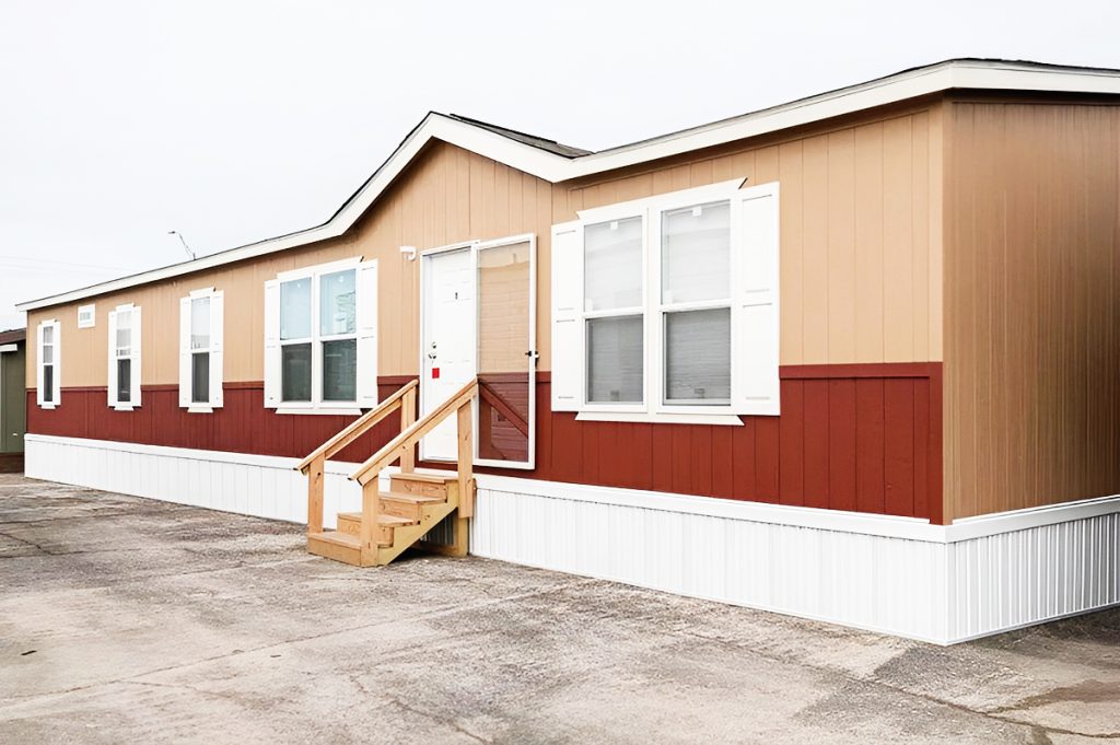 single wide mobile home with white vinyl skirting