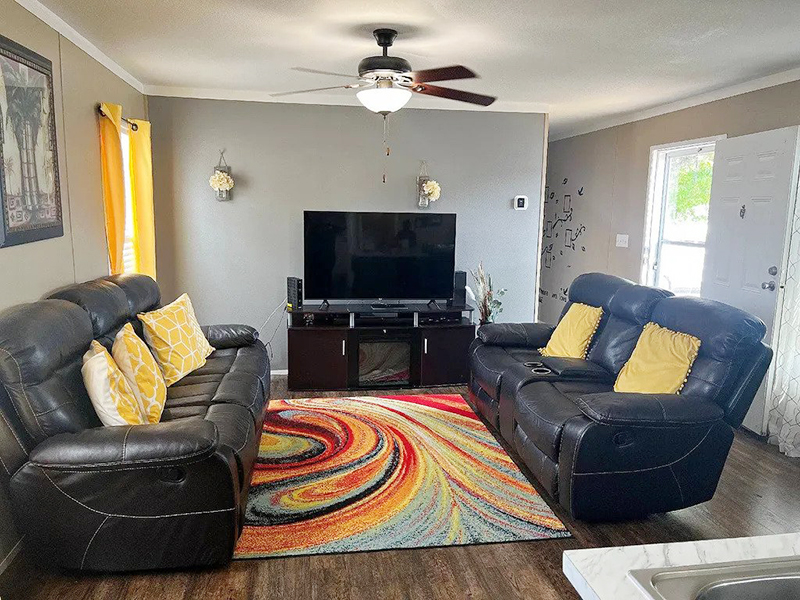 Add rugs and curtains mobile home living room