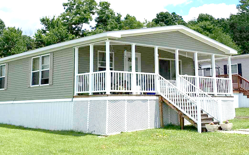 double wide mobile home with covered front porch