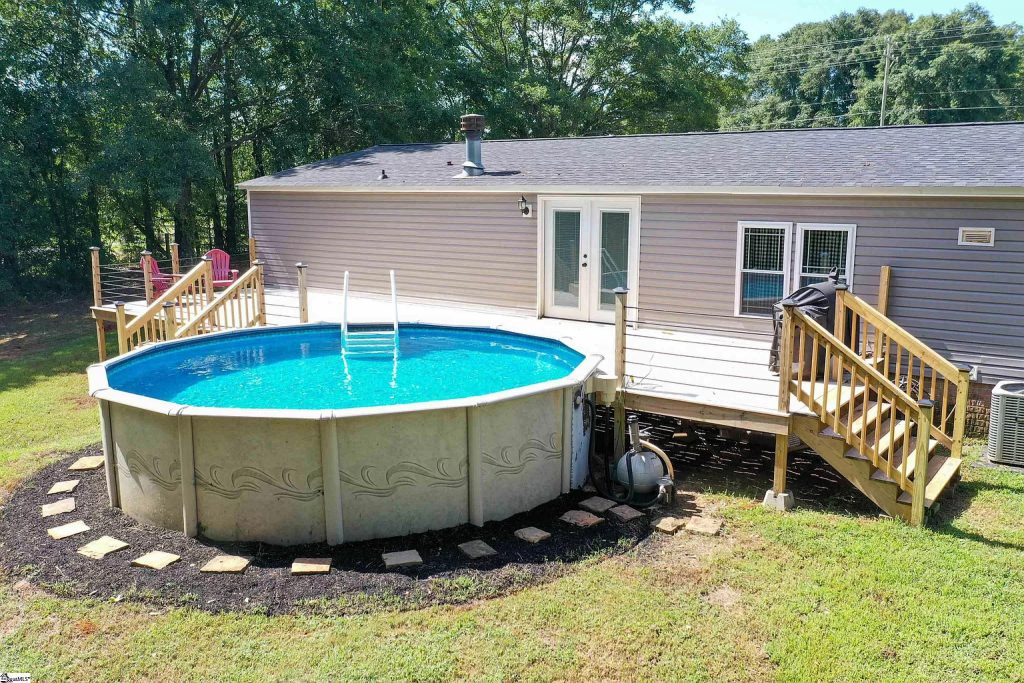 mobile home patio and above ground pool