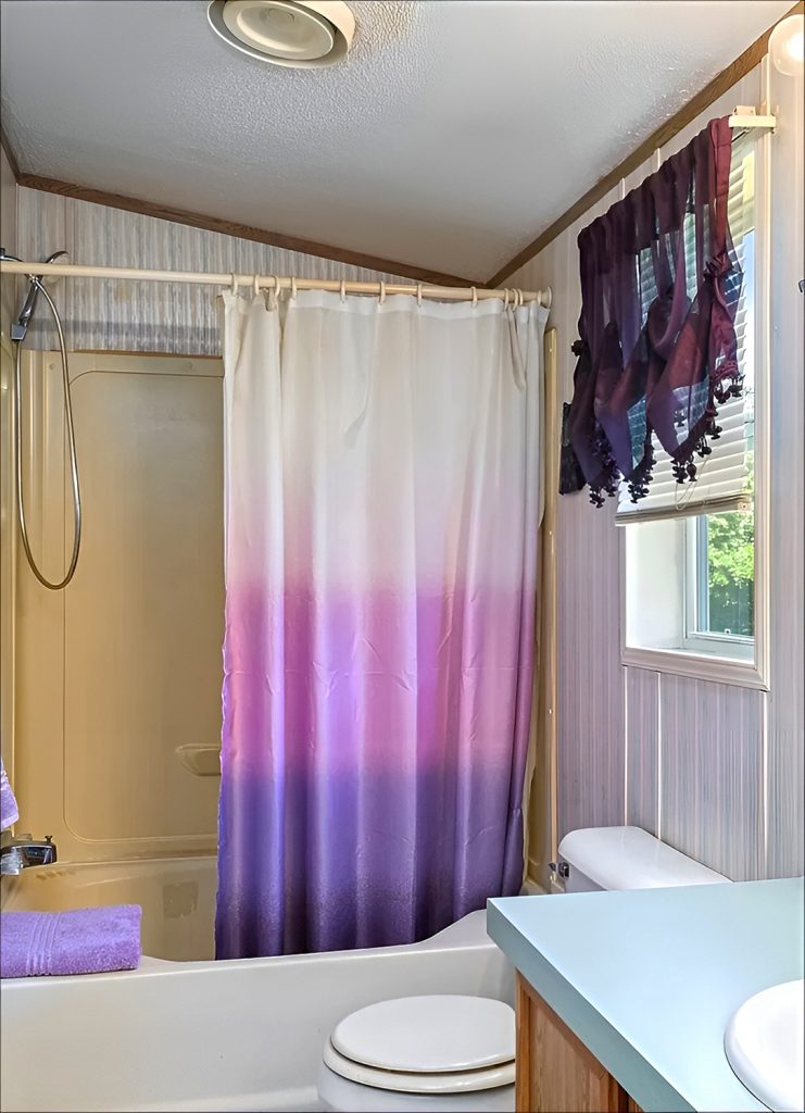 Mobile Home Bathroom Window with Café Curtains
