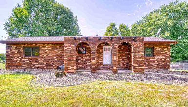 This 1977 Mobile Home Gets a Brick Exterior Makeover