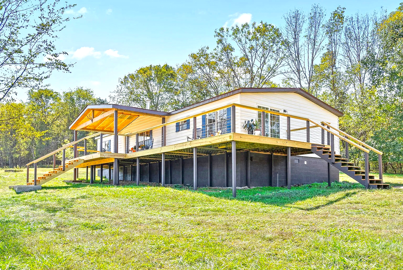 Double Wide Mobile Home with A Wrap Around Porch and Modern Interior