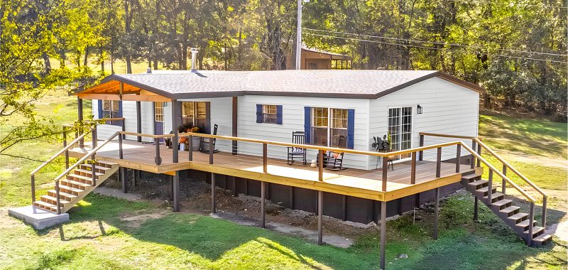 Double Wide Mobile Home with A Wrap Around Porch and Modern Interior