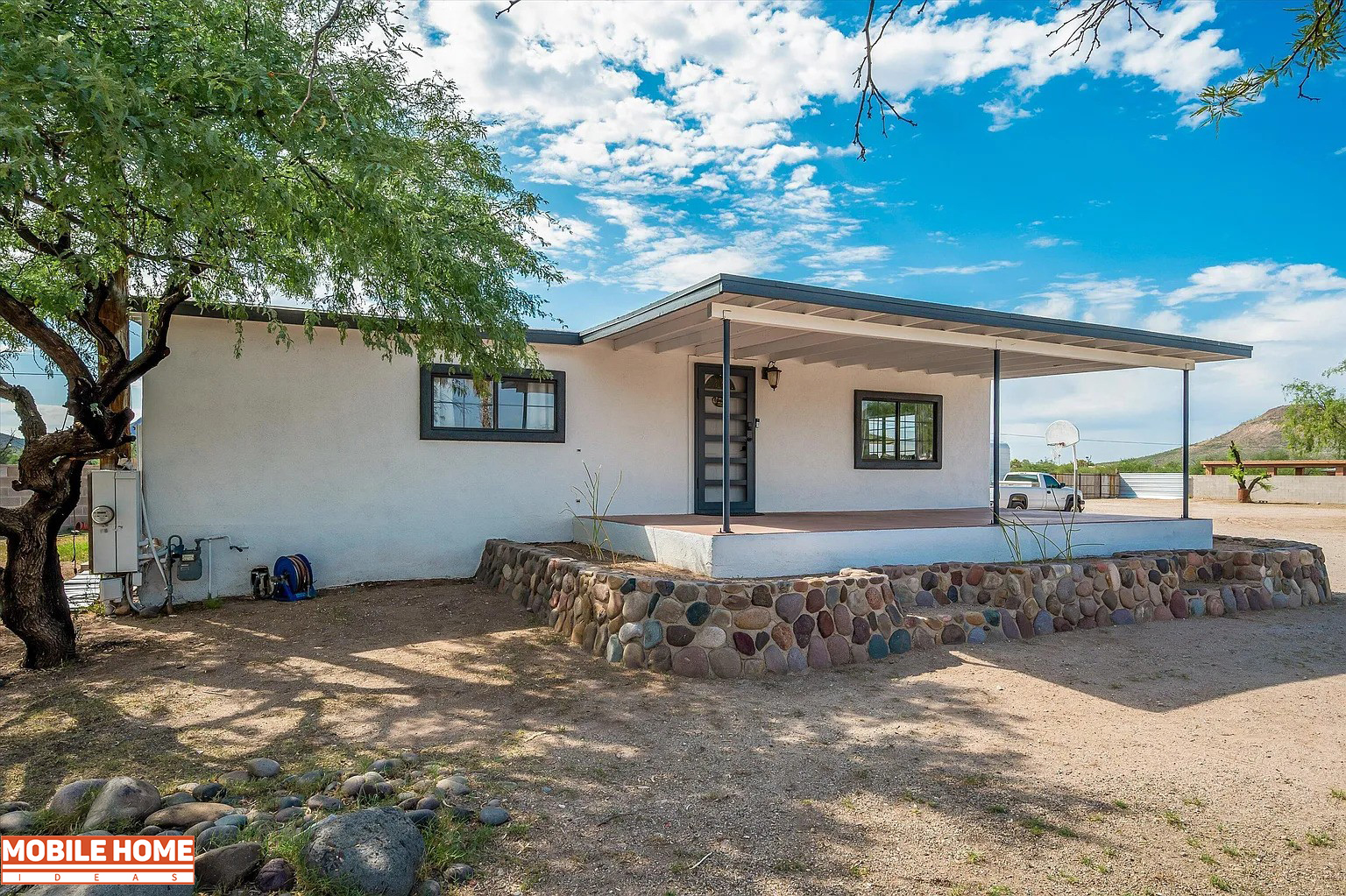 1972-Double-Wide-Mobile-Home-Makeover---Rock Skirting