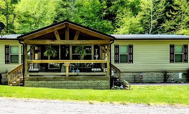 How to Create a Cozy Rustic Front Porch for Your Mobile Home