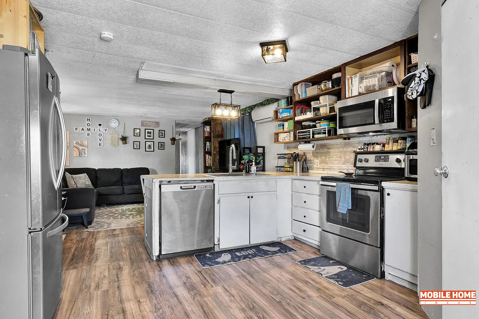 Single-Wide-Mobile-Home-Kitchen-with-Rustic-Industrial-Style-Lighting