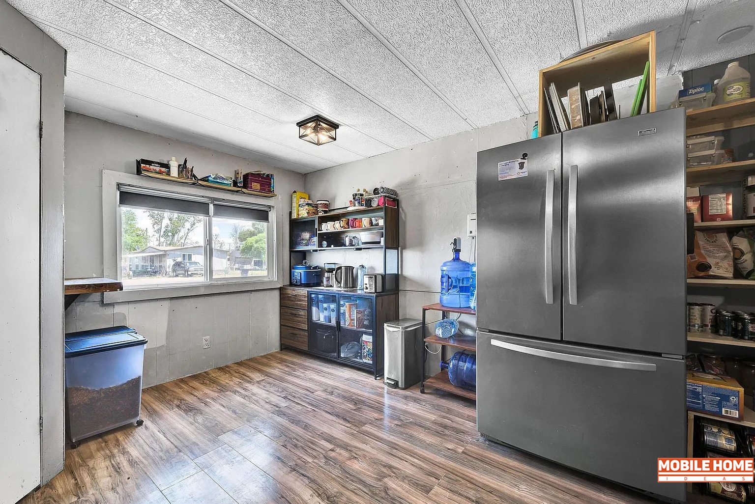 Single-Wide-Mobile-Home-Kitchen-with-Rustic-Industrial-Style-Storage