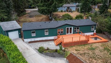A Teal Double Wide Mobile Home Tour: From Bold Exterior to Bright Interior